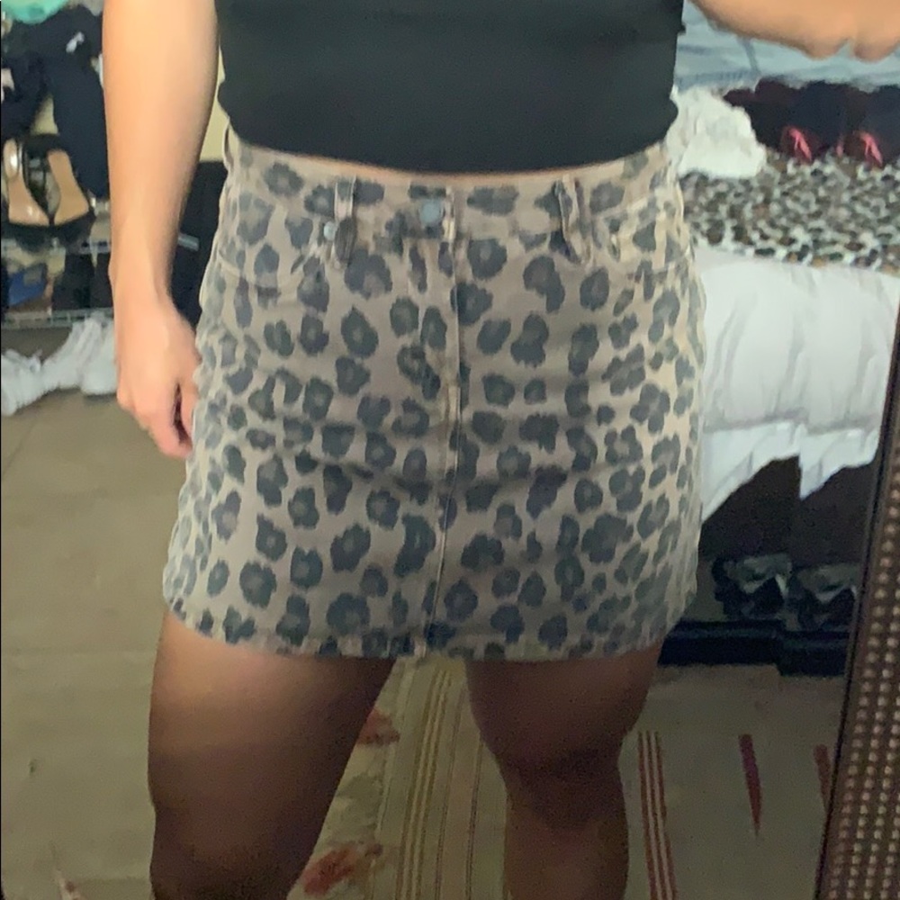 Cheetah print high waisted jean skirt. Size 27.